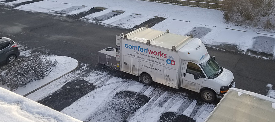 Comfortworks Cooling and Heating van parked outside a West Berlin, NJ home for heating service
