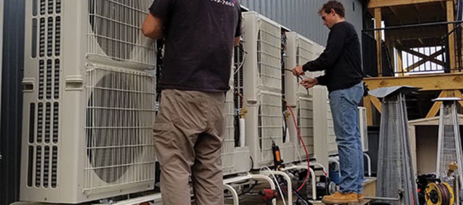Comfortworks Cooling and Heating Technicians Working On Ductless